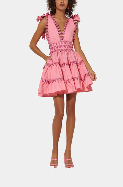cheli mini dress Flirty and full of flair, the Cheli Dress is a denim mini with serious  impact. Designed with a plunging neckline, bold ruffle trim, and  embroidered details in yellows, greens and oranges, its a